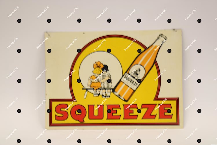 Squeeze w/bottle & couple logo sign