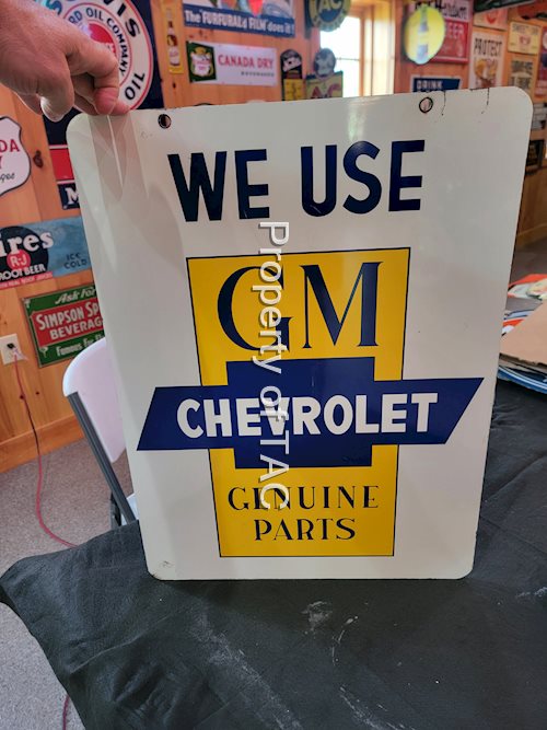 We Use GM Chevrolet Genuine Parts Metal Sign & Hanger
