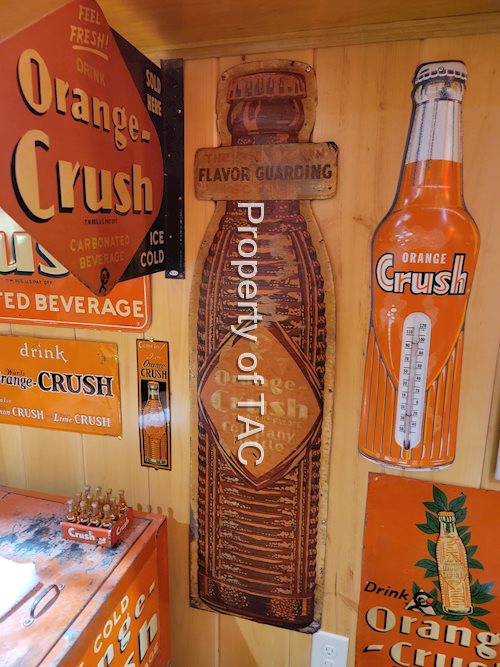 Orange-Crush "Flavor Guarding" Bottle Shaped Metal Sign